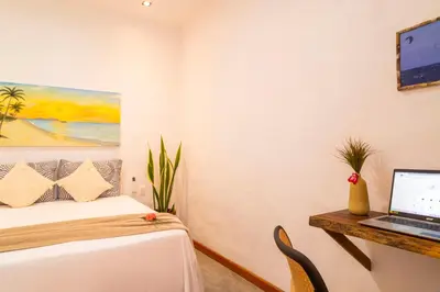 Uma televisão e/ou sistema de entretenimento em Suite Sol Preazen