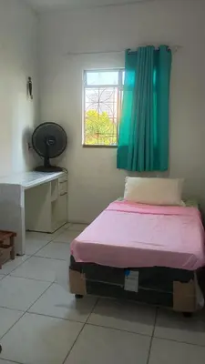 Uma cama ou camas num quarto em Chalé Rústico Fortaleza