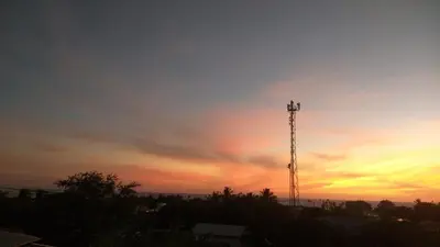 O nascer ou o pôr do sol visto a partir do bed and breakfast