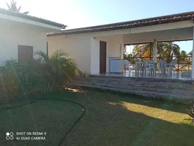 Um jardim no exterior de Casa hóspedes Dferiasicaraizinho