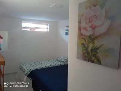 Uma cama ou camas num quarto em Casa hóspedes Dferiasicaraizinho