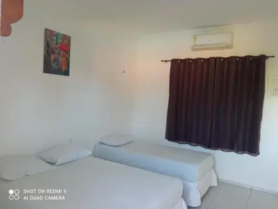 Uma cama ou camas num quarto em Casa hóspedes Dferiasicaraizinho