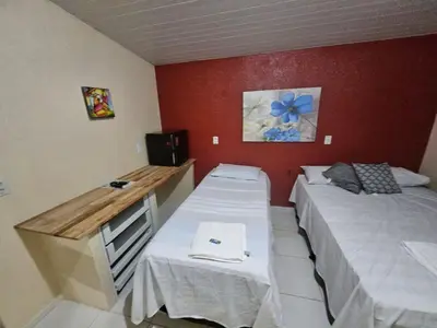 Uma cama ou camas num quarto em Pousada Mar de Iracema