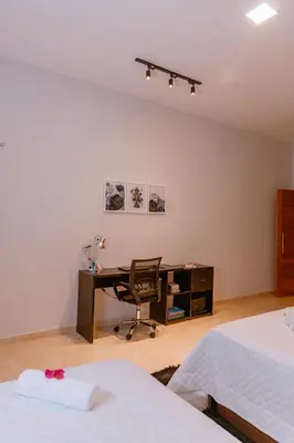 Uma cama ou camas num quarto em Casa Irashai