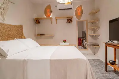 Uma cama ou camas num quarto em Chalé dos Ventos Preá - CE