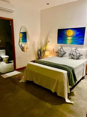 Uma cama ou camas num quarto em Suite Lua Preazen