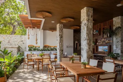 Um restaurante ou outro lugar para comer em Saluz Boutique Hotel