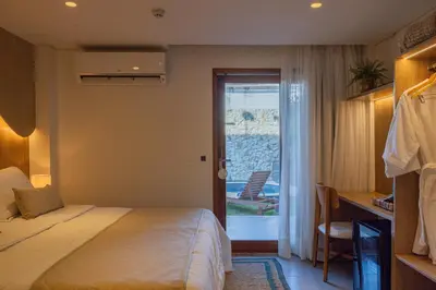 Uma cama ou camas num quarto em Saluz Boutique Hotel