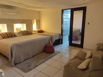Uma cama ou camas num quarto em Vila Nordestina