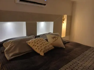 Uma cama ou camas num quarto em Vila Nordestina