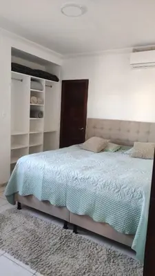 Uma cama ou camas num quarto em Vila Nordestina