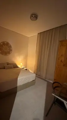 Uma cama ou camas num quarto em jardim Iracema