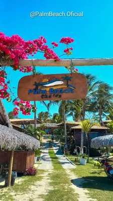 Um jardim no exterior de Palm Beach Pousada - Praia de Caetanos Quarto Casal ou Triplo