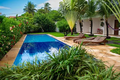A piscina em ou perto de Bosque Cumbuco Pousada