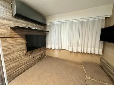 Uma televisão e/ou sistema de entretenimento em LOFT VIP Vista Mar Beach Class Fortaleza