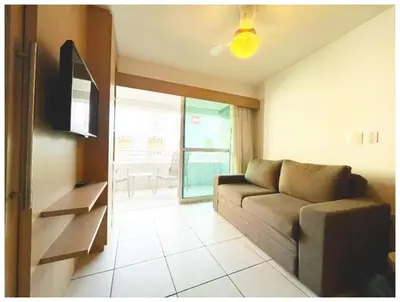 Uma televisão e/ou sistema de entretenimento em Beach Class Fortaleza by Holiday Stays