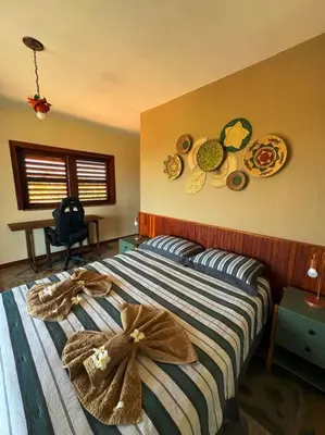 Uma cama ou camas num quarto em Casa de Sabá