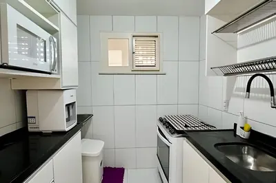 A cozinha ou kitchenette de Bouganville Apartments