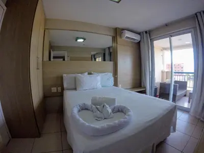 Uma cama ou camas num quarto em Beach Village Vista maravilhosa, lazer total 205