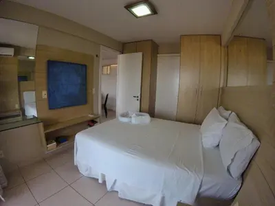 Uma cama ou camas num quarto em Beach Village Vista maravilhosa, lazer total 205