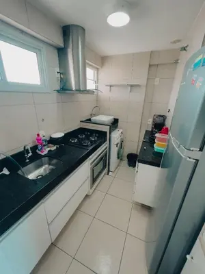 A cozinha ou kitchenette de Beach Village Vista maravilhosa, lazer total 205