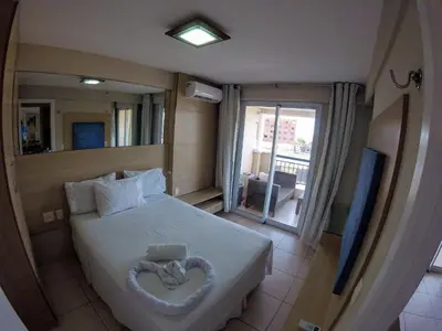 Uma cama ou camas num quarto em Beach Village Vista maravilhosa, lazer total 205