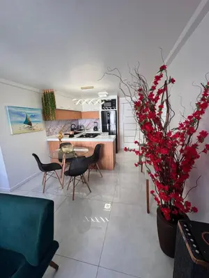 A cozinha ou kitchenette de Apartamento alto padrão moderno frente a praia com 2 quartos melhor localização beira mar