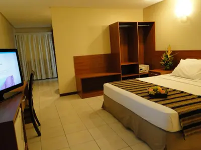 Uma televisão e/ou sistema de entretenimento em Costa do Mar Hotel