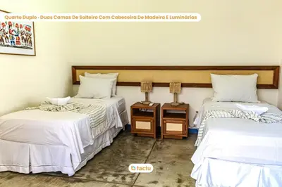 Uma cama ou camas num quarto em Casa Pipa com piscina no Jaguaribe Villas