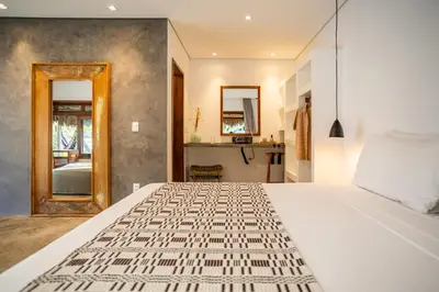Uma cama ou camas num quarto em Nordisch- Chalés