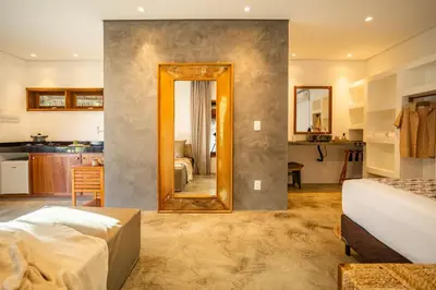 Uma cama ou camas num quarto em Nordisch- Chalés