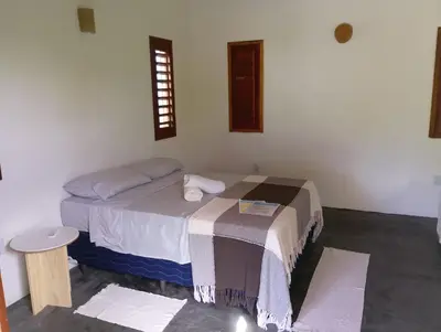 Uma cama ou camas num quarto em Villa Bôa Viagem