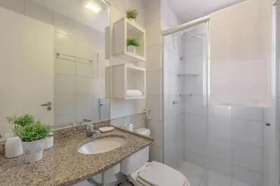 Uma casa de banho em Portamaris Resort #201 - Beira mar por Carpediem