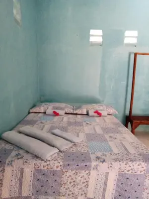 Uma cama ou camas num quarto em Casa azul