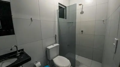 Uma casa de banho em Pousada do Gegeo
