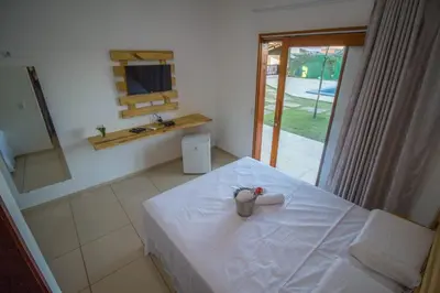 Uma cama ou camas num quarto em Villa Coco Beach Preá