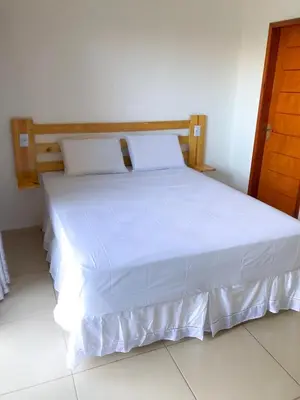 Uma cama ou camas num quarto em Villa Coco Beach Preá
