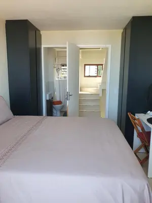 Uma cama ou camas num quarto em Casa de praia do Zeca