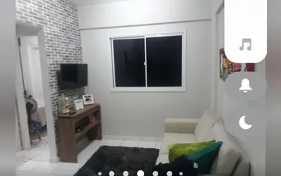 Uma televisão e/ou sistema de entretenimento em Apartamento em Messejana com lazer completa apto inteiro