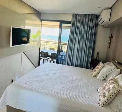 Uma cama ou camas num quarto em landscap Meireles Fortaleza