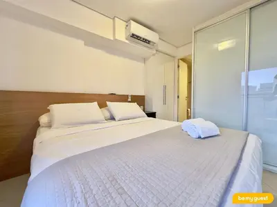 Uma cama ou camas num quarto em Landscape melhores apartamentos da Beira Mar