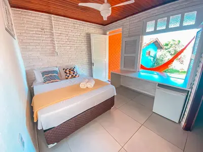 Uma cama ou camas num quarto em Hotel Sunshine Centro Cumbuco