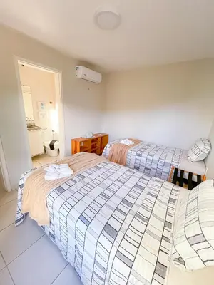 Uma cama ou camas num quarto em Vg Sun Cumbuco condomínio completo