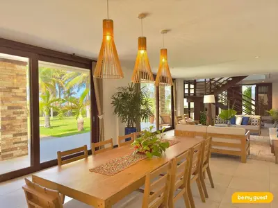 Uma área de estar em Villas - Beach House