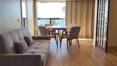 Uma área de estar em Iracema Residence Frente Mar by Escala Imóveis