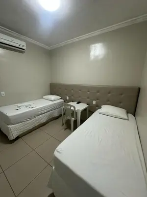 Uma cama ou camas num quarto em PRINCESA HOTEL Russas