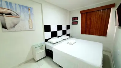 Uma cama ou camas num quarto em Atlantic Ocean
