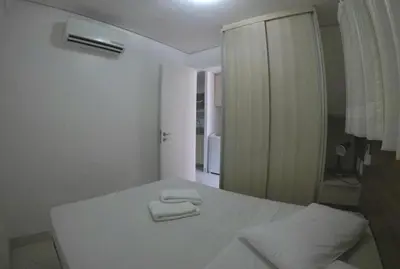 Uma cama ou camas num quarto em Landscape Comfort Residences