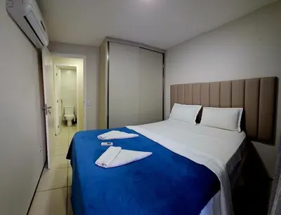 Uma cama ou camas num quarto em Terraços do Atlântico