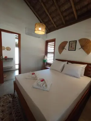 Uma cama ou camas num quarto em Casa da Lagoa - Icaraí Kite Village